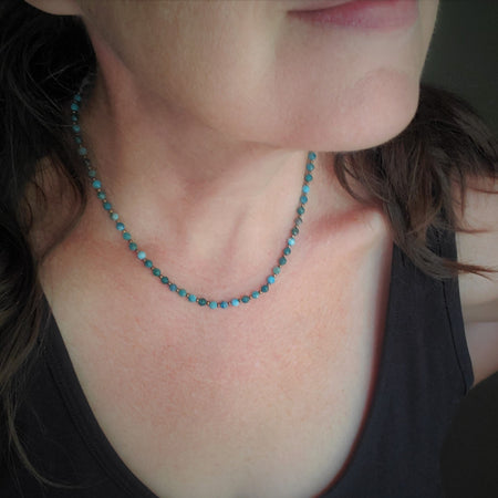 Beaded necklace with Blue Apatite and copper on model