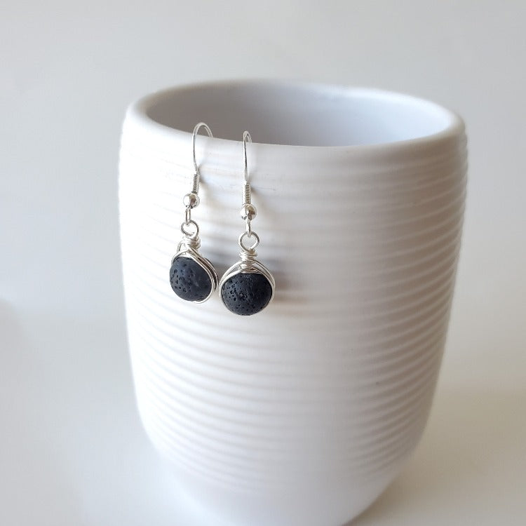 Black Lava herringbone wrapped earrings hanging