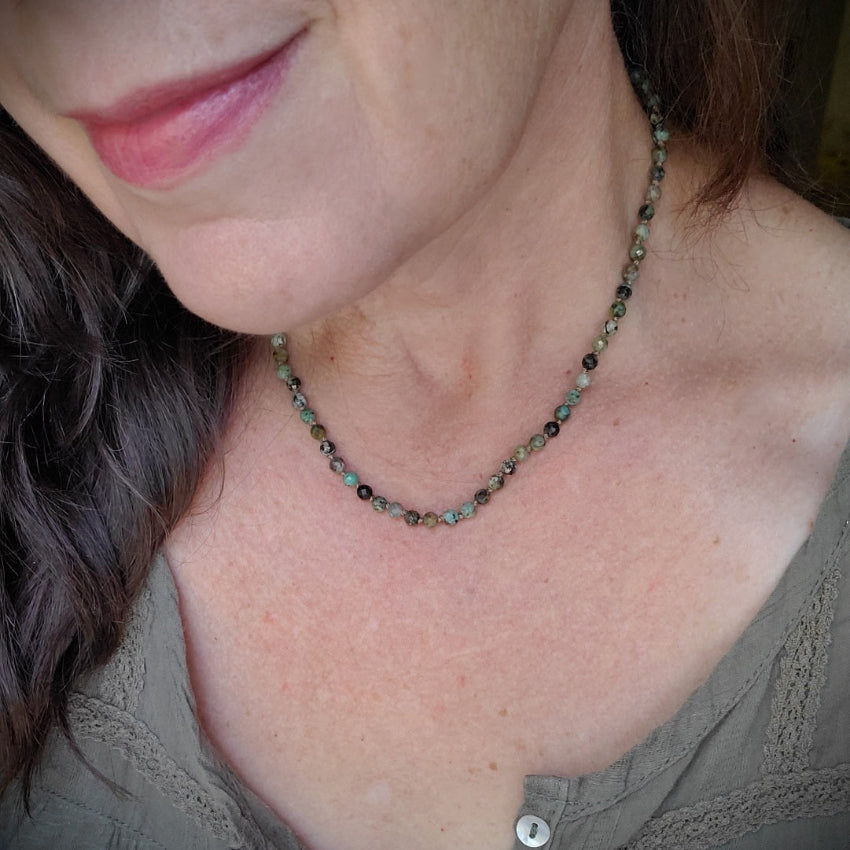 Faceted African Turquoise hand knotted necklace on model