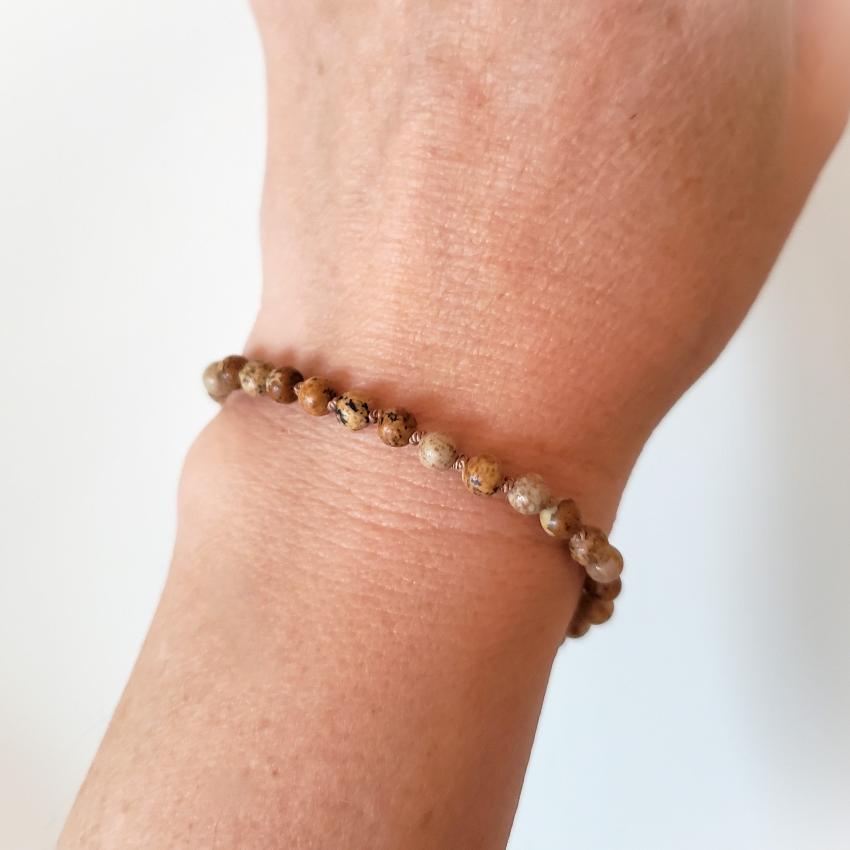 Picture jasper knotted bracelet on model