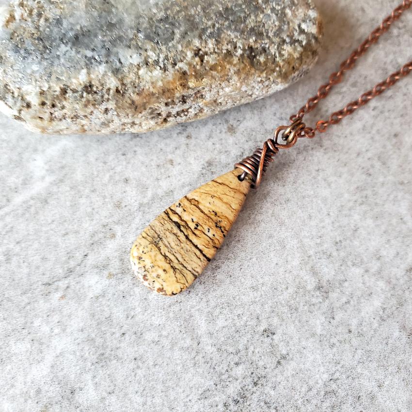 picture jasper teardrop pendant copper necklace on tile
