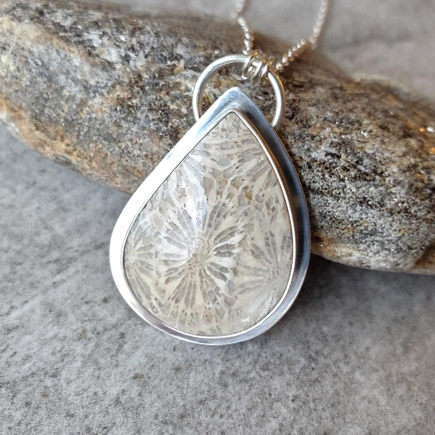 fossil coral freeform silversmith pendant on tile