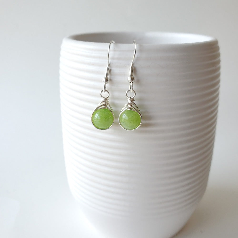Peridot earrings with herringbone wrapped design