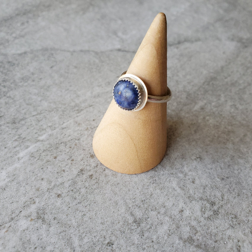 Lapis Lazuli silversmith ladies ring on wood stand
