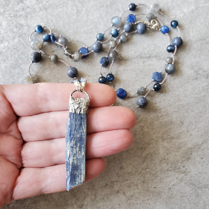 Blue Kyanite Labradorite long knotted necklace in hand