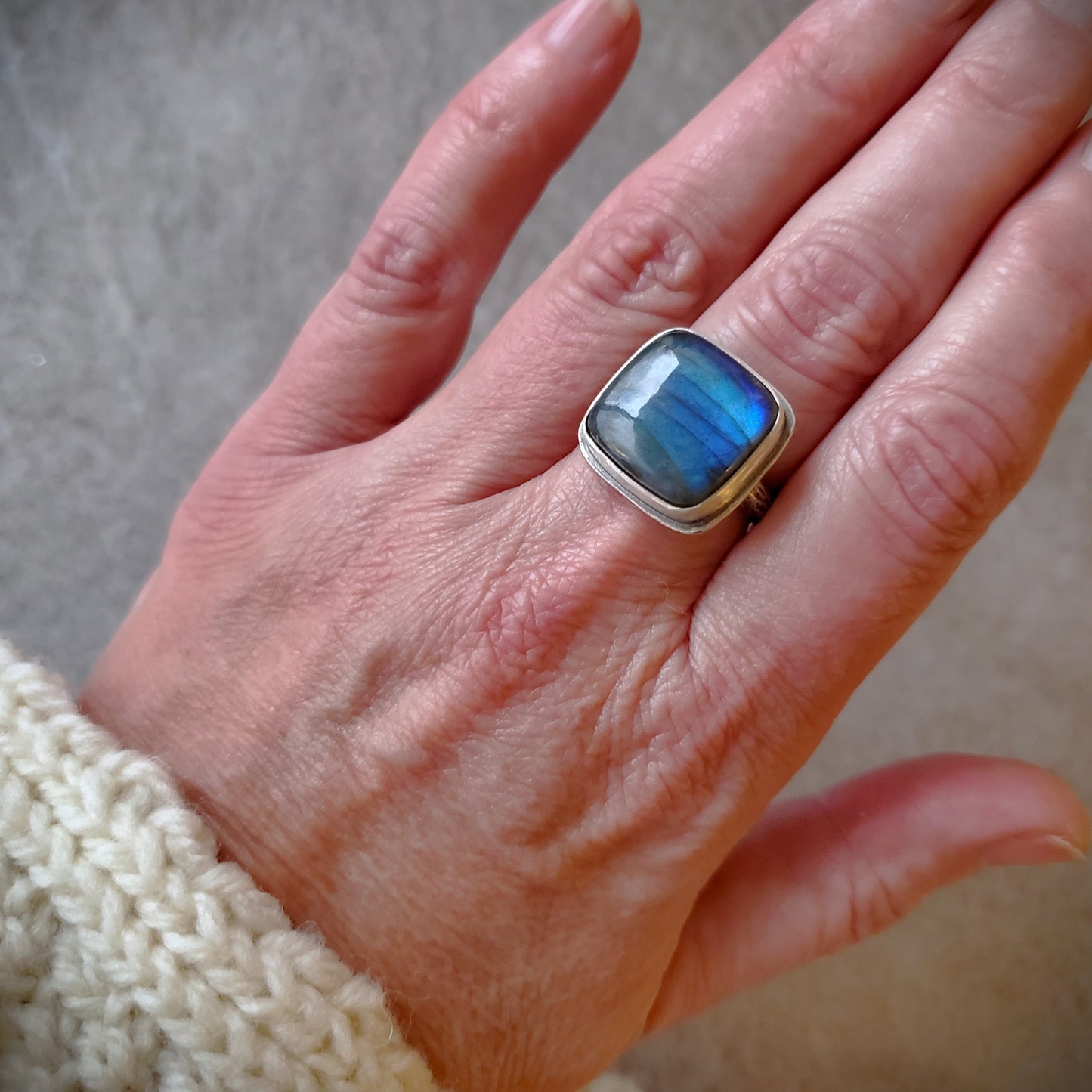 Labradorite silversmith ring on hand