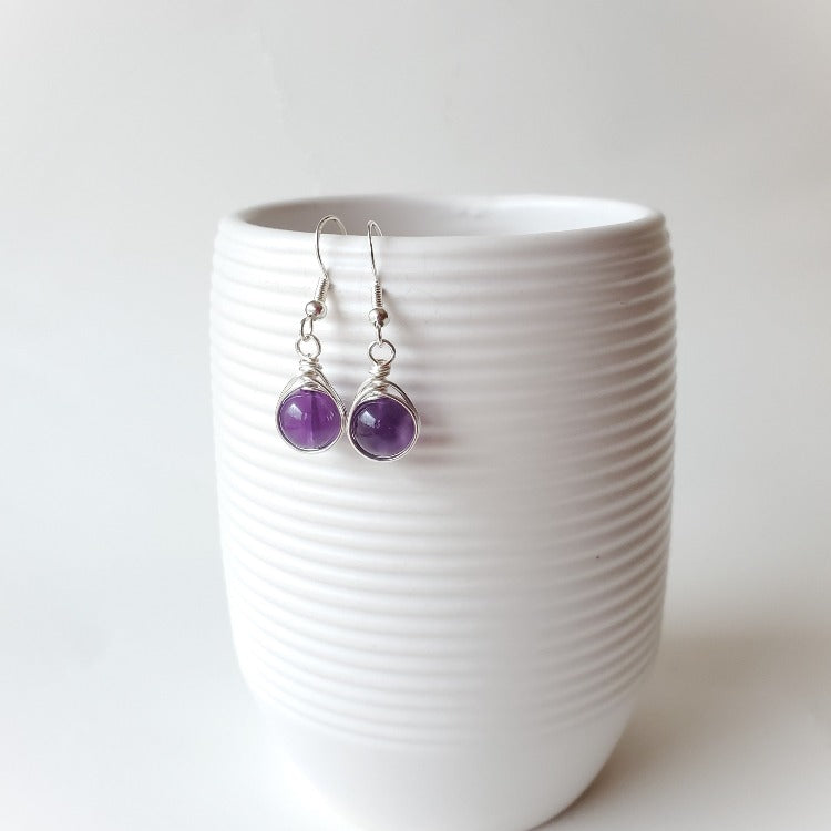 Amethyst herringbone wrap silver earrings hanging