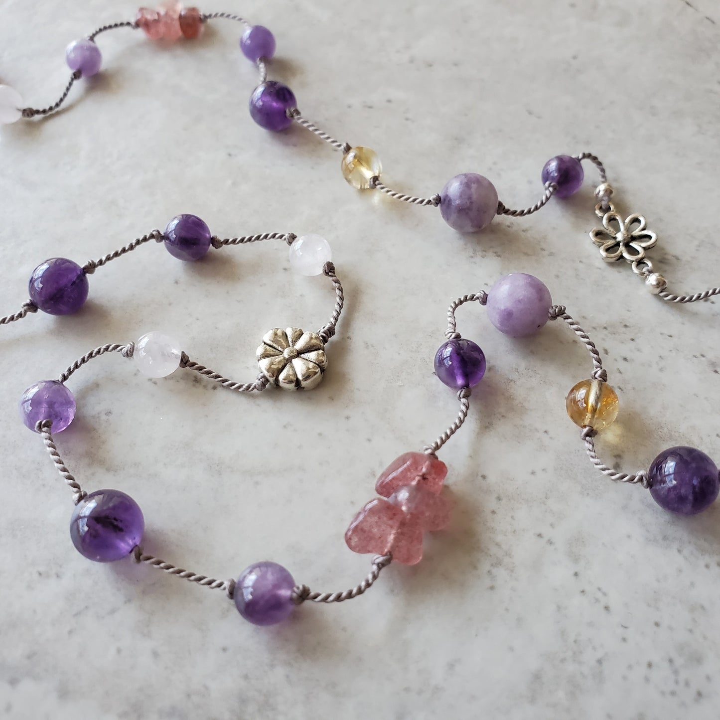 Multi gemstone Hand knotted long necklace with dragonfly pendant close up