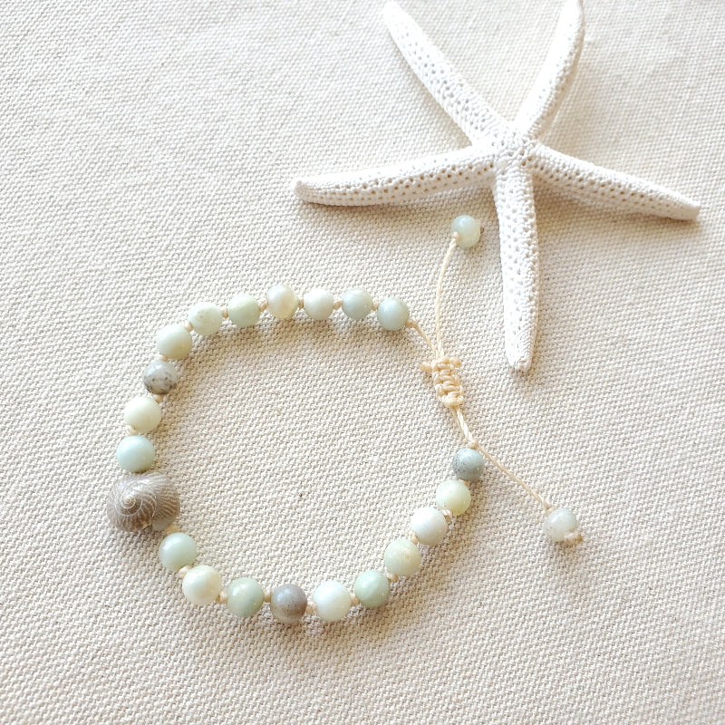 Amazonite and shell bracelet on linen