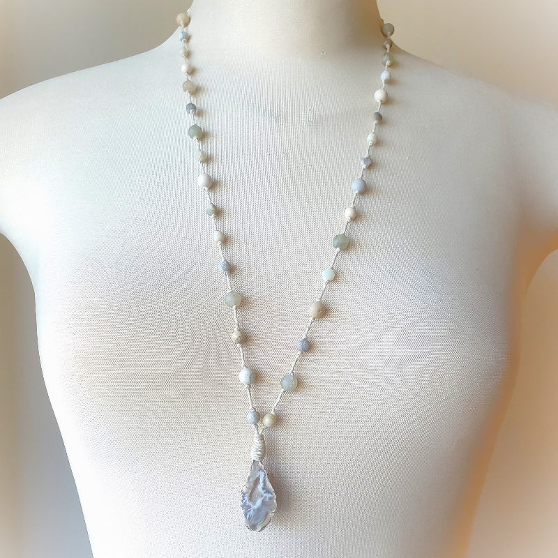 Necklace with a large pendant on a mannequin