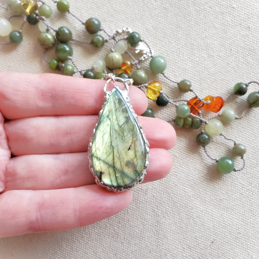 Labradorite focal multi gemstone necklace in hand 