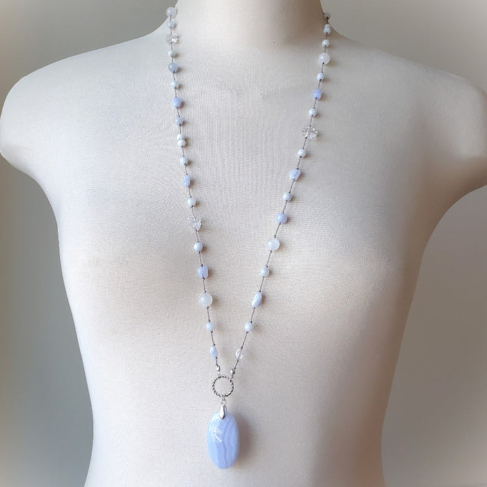 Multi Gemstone long knotted necklace on bust