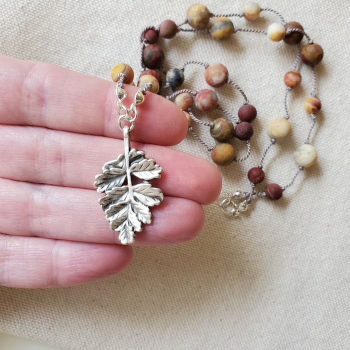 Hand knotted silk necklace with Picasso Jasper and Crazy Lace agate