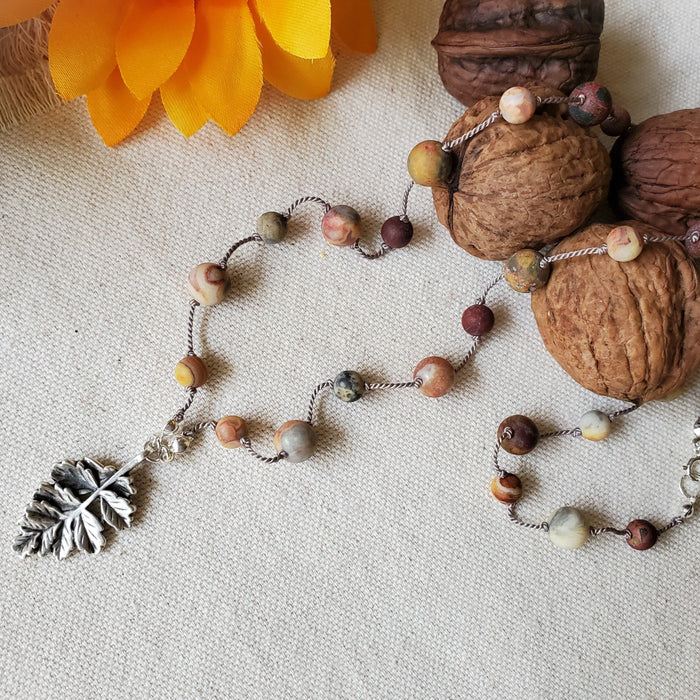 Hand knotted silk necklace with Picasso Jasper and Crazy Lace agate