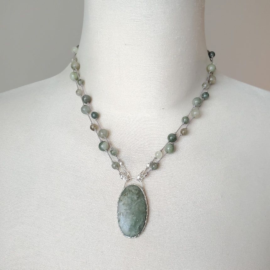 Beaded gemstone necklace on bust