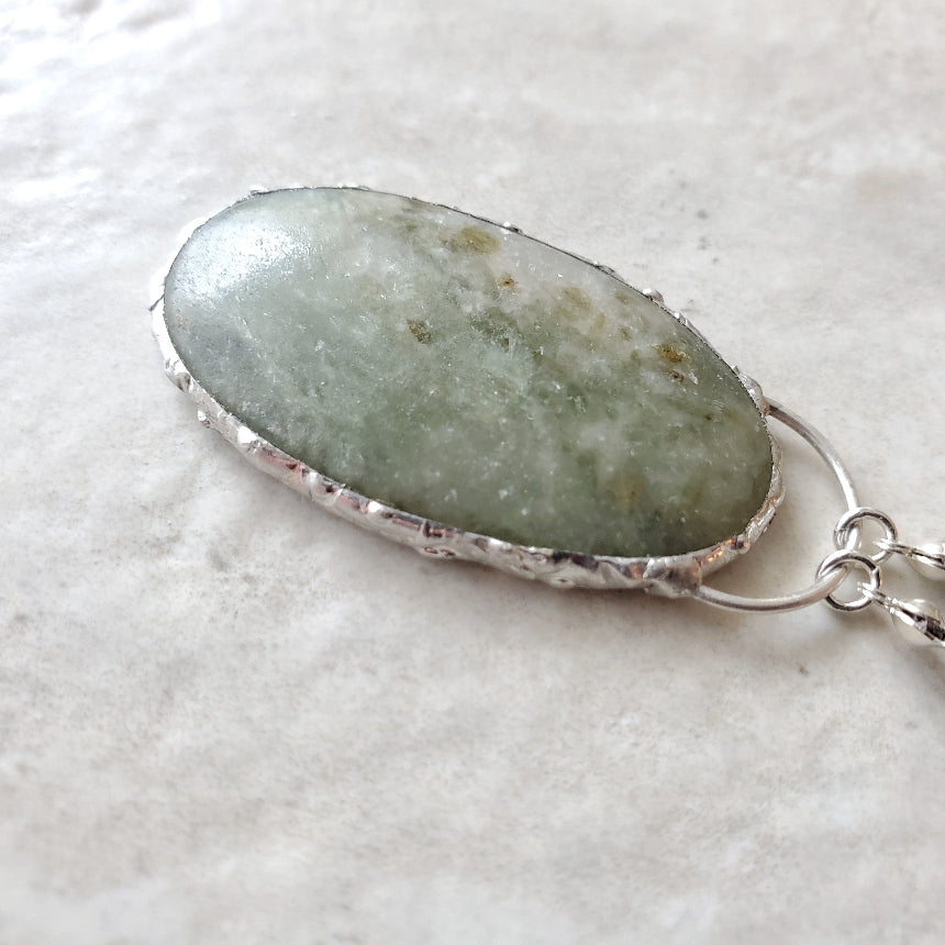 Caribbean Calcite focal stone on tile