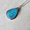 Arizona turquoise silversmith necklace on tile