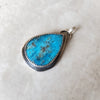 Arizona turquoise silversmith pendant only on tile