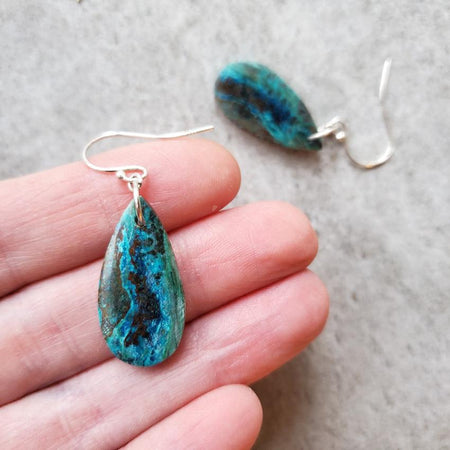 Chrysocolla teardrop sterling silver earrings in hand