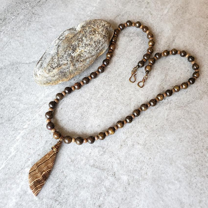 Bronzite and Aragonite chunky necklace on tile 