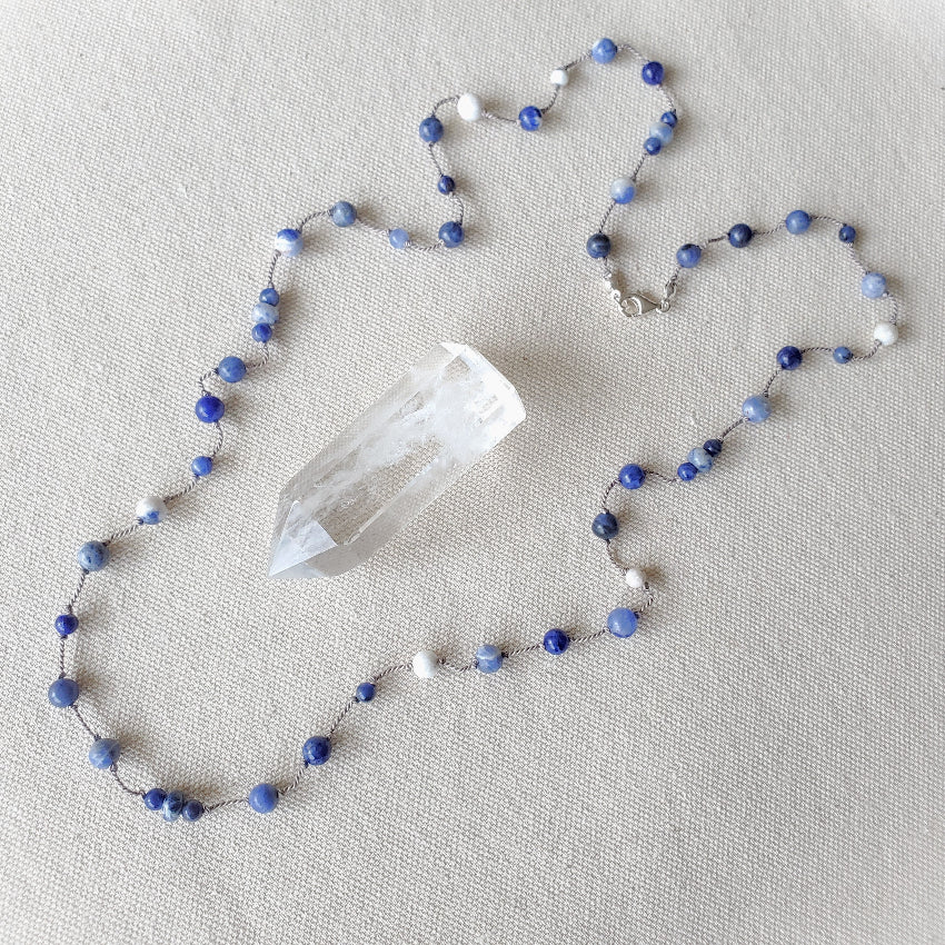 Silk knotted Sodalite necklace on linen