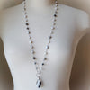 long Zebra Calcite hand knotted beaded necklace on bust