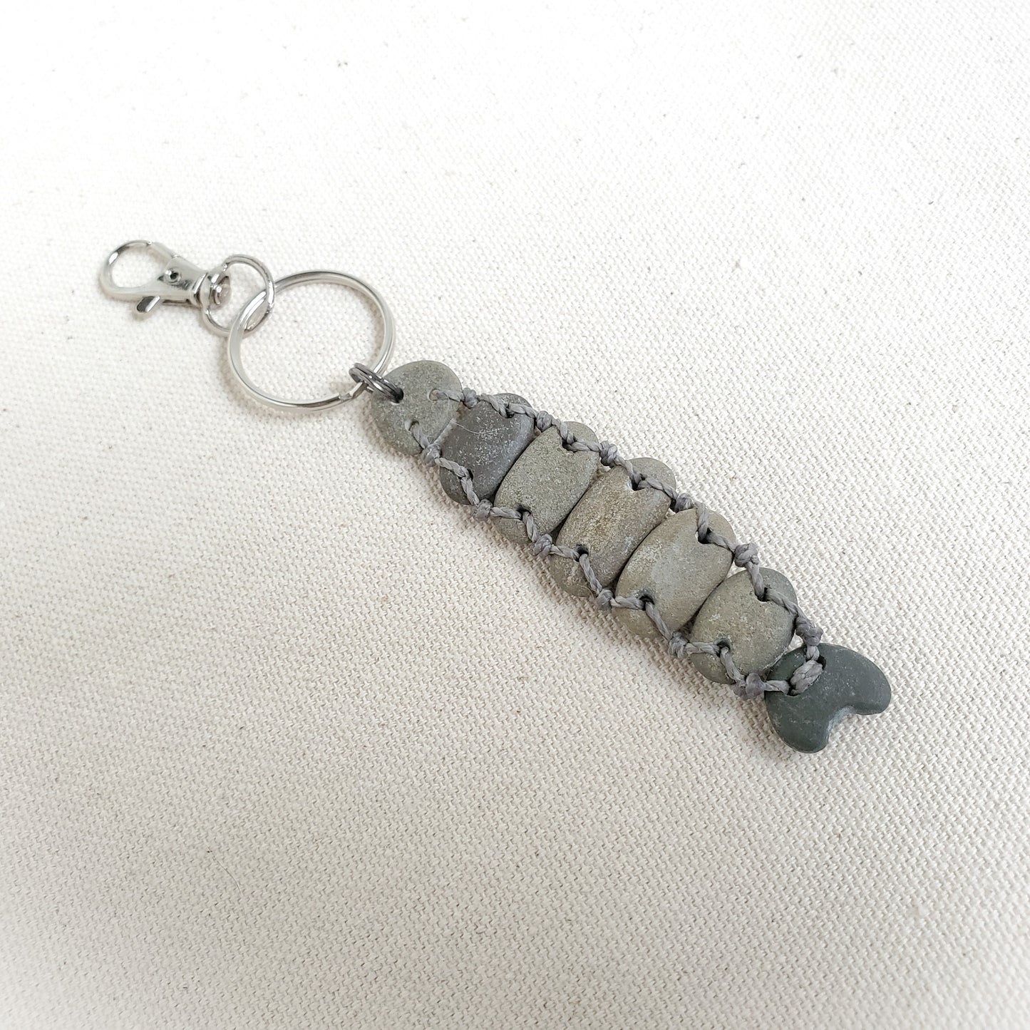 beach rock keychain on a white background