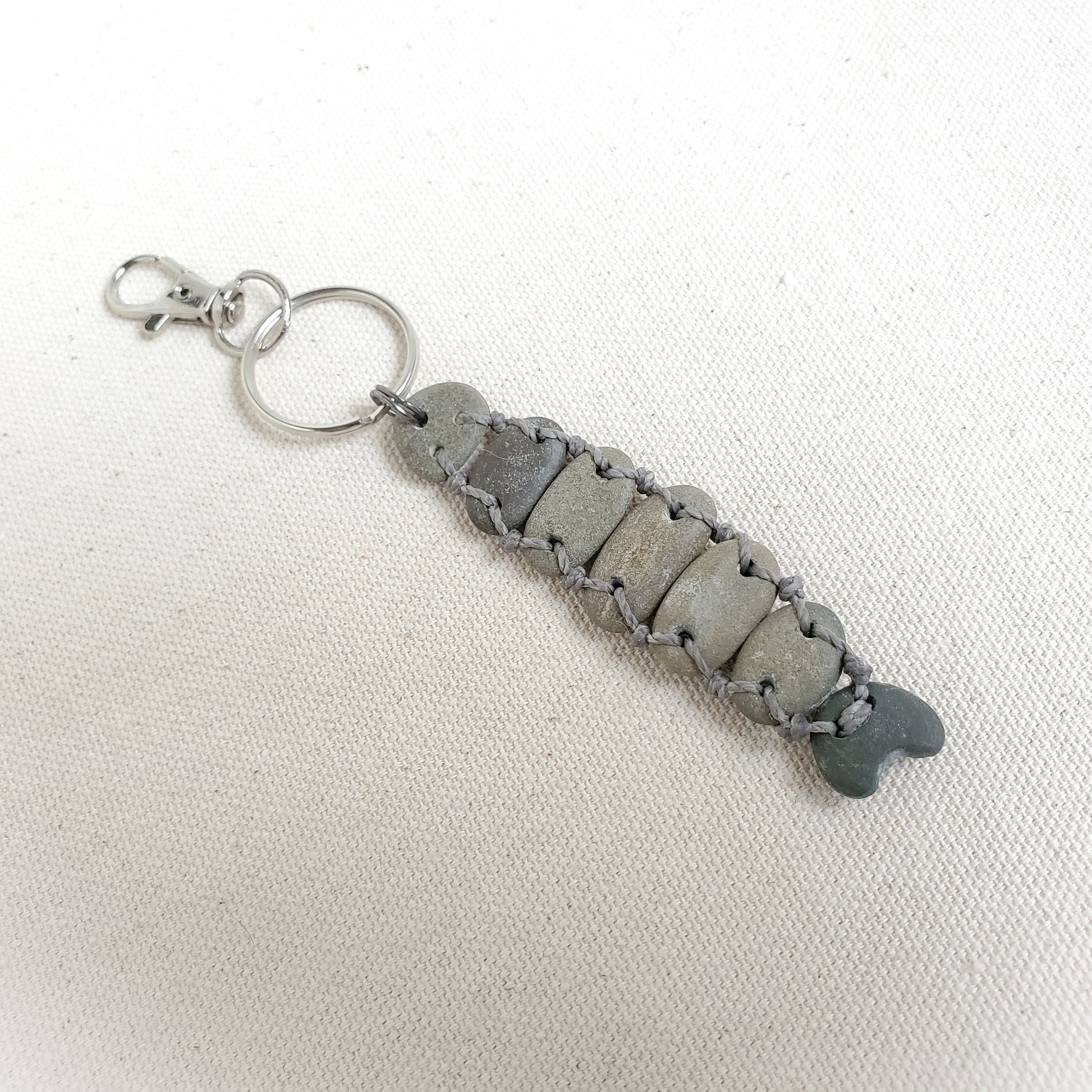 beach rock keychain on a white background