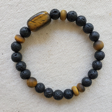 Black lava & Tiger's eye stretch bracelet on linen