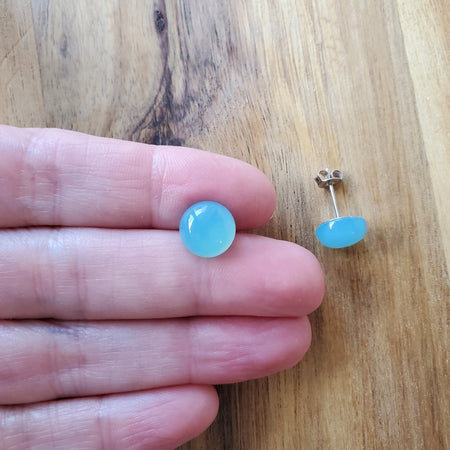 blue chalcedony stud earrings in hand
