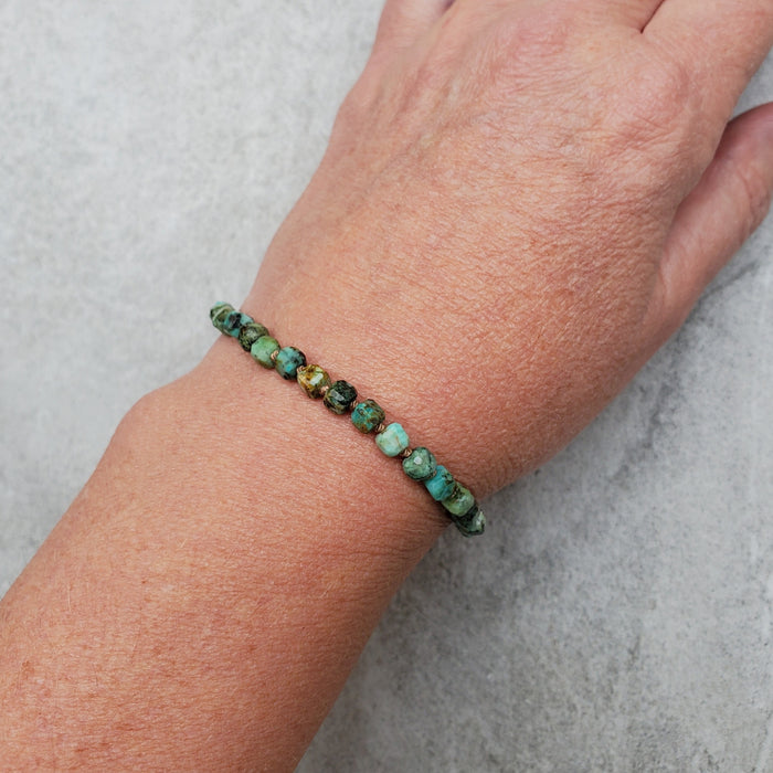 Faceted African turquoise bracelet on model