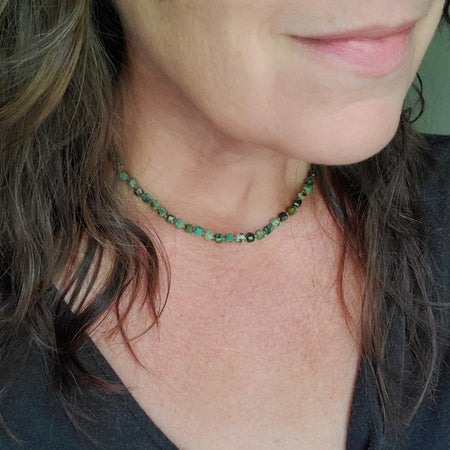 Hand knotted African Turquoise necklace on model