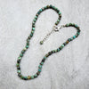 Faceted 4mm cube African Turquoise necklace on tile 