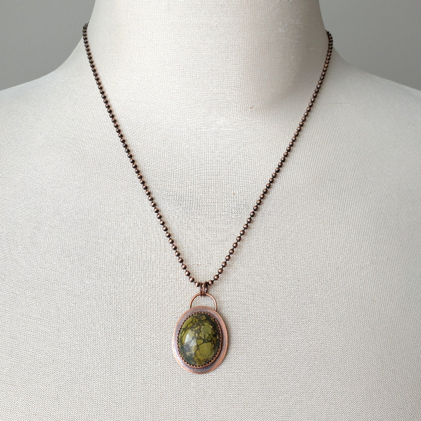 Tibetan Turquoise metalsmith necklace on bust