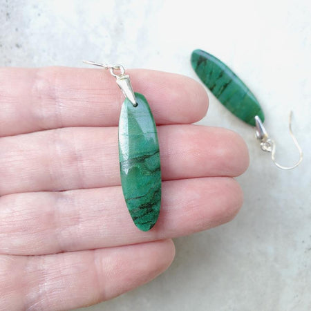 African Jade gemstones on sterling silver ear wires in hand