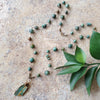 Blue Opal and African Turquoise knotted necklace on tile 