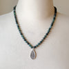 Hand knotted green moss agate necklace on bust