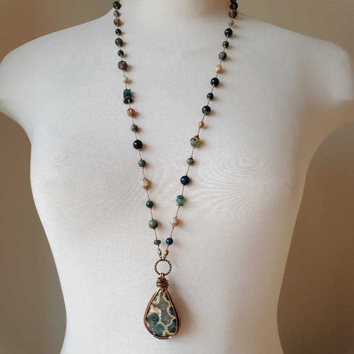 Long beaded gemstone necklace with Ocean Jasper focal on bust