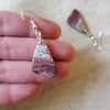 Freeform Ocean Jasper sterling silver earrings in hand