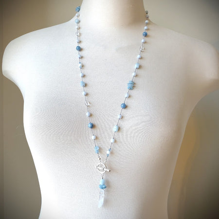 Aquamarine and crystal long hand knotted necklace on bust