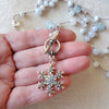 long multi bead silk knotted necklace with snowflake focal