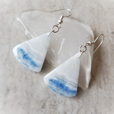 Blue Scheelite gemstone earrings on ice