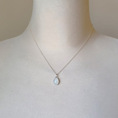 faceted white moonstone pendant on bust