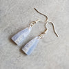 freeform blue lace agate earrings on wood