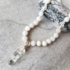 Silk knotted white crazy lace agate with crystal point close up