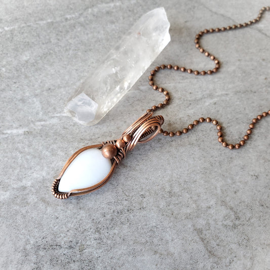 White Opal copper wire wrap pendant on tile