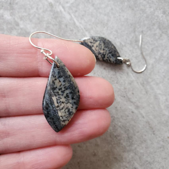 Honey dendrite freeform earrings in hand