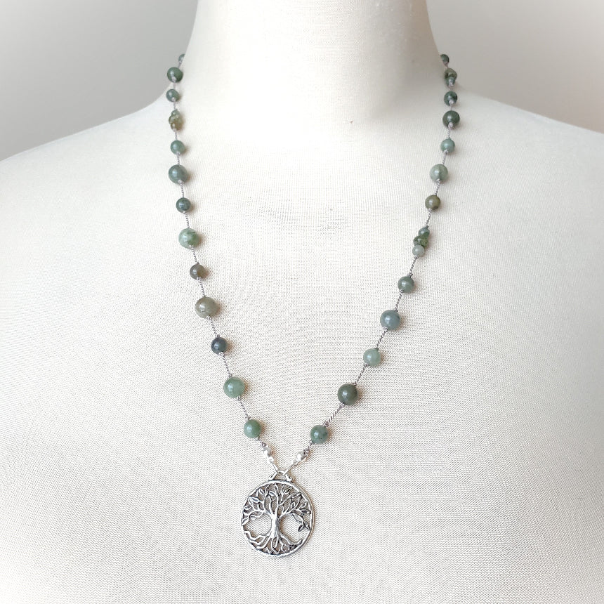 African Jade knotted Necklace with tree of life pendant on a mannequin