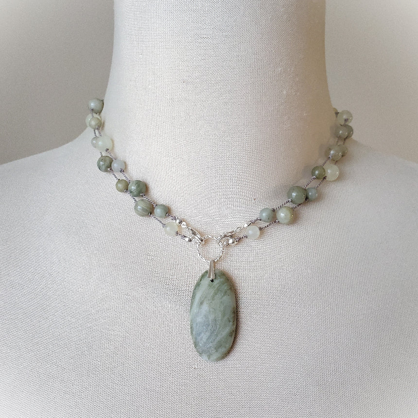 Beaded gemstone necklace with Serpentine focal on bust