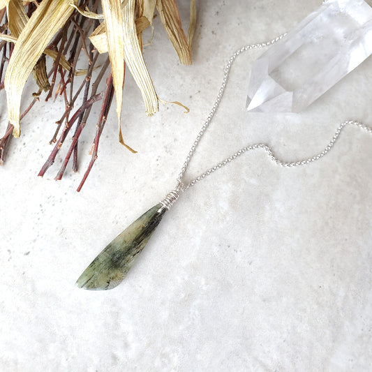 Green Kyanite freeform pendant necklace on tile